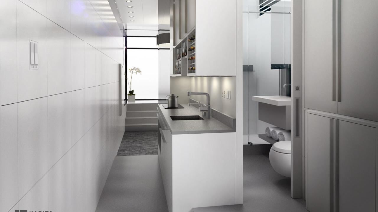 Space-efficient kitchen by Kasita. Counter and sink in the middle of the space. Grey counter tops and white cabinets. Space-efficient kitchen by Kasita. Counter and sink in the middle of the space. Grey counter tops and white cabinets.