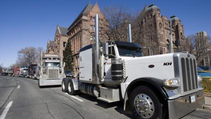 Transport trucks in front of Queen's Park in Toronto from the article What’s ON: The week that was in Ontario politics (January 31-February 4)