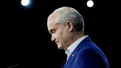 profile of man in blue suit with head bowed from the article ‘Anything to end the insanity’: A Tory insider on O’Toole’s ouster